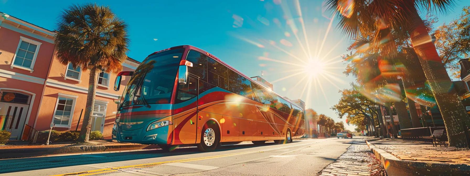 a vibrant coach bus gleams under the bright georgia sun, parked against the picturesque backdrop of abbeville's charming streets, showcasing its sleek design and spacious allure.